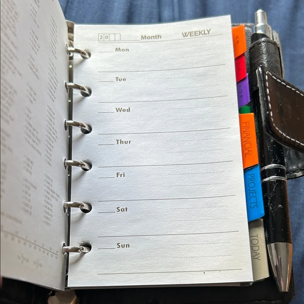 Black and Brown planner with the pen